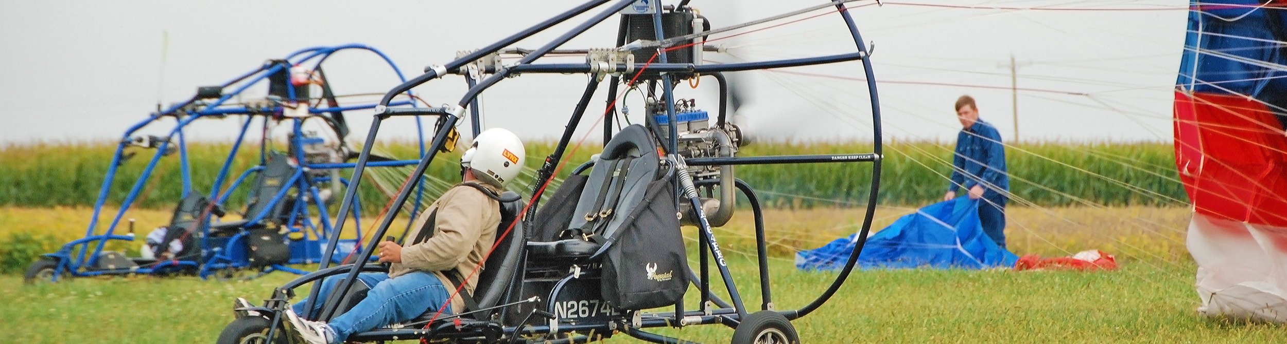 Student taking off for a solo powered parachute flight